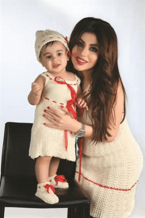 صور حليمة بولند الاولى مع ابنتها